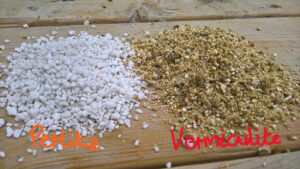 little piles of perlite and vermiculite